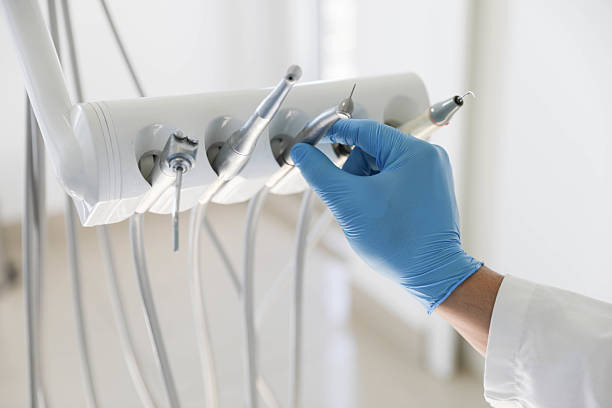 Professional Tooth Extraction technician working in Southmayd, TX